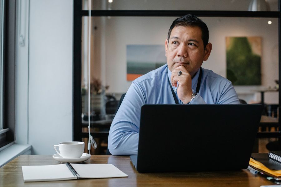 Attorney preparing legal advice for a client in a modern office